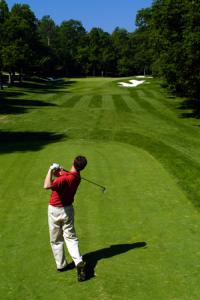 Golfer swinging